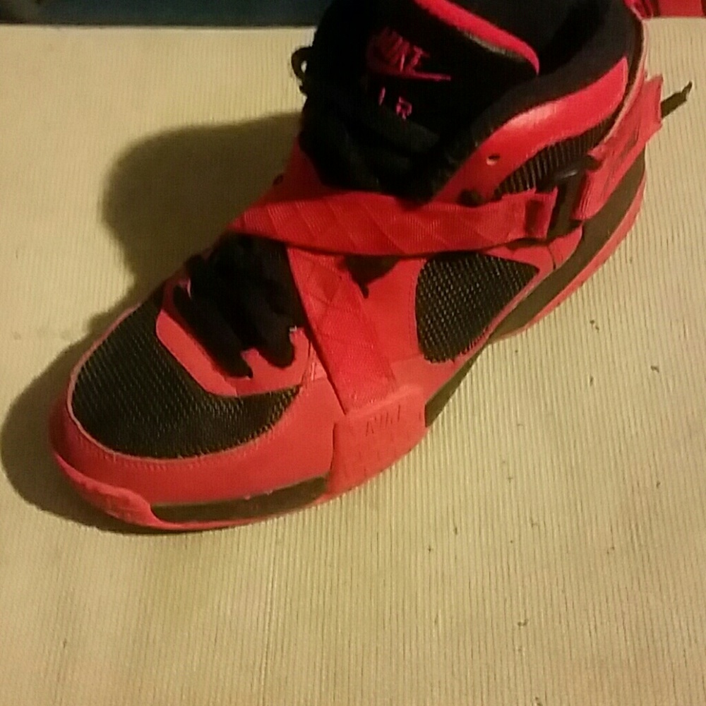 Black and red Nike air raids